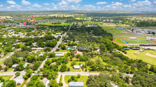Aerial-style yard view of 914 6th Street in Blanco, Texas
