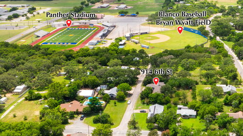 Aerial-style neighborhood view near 914 6th Street in Blanco, Texas